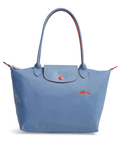Longchamp L - Azul com acabamento em vermelho