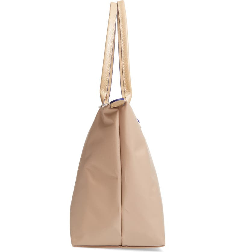 Longchamp L - Bege com acabamento em azul