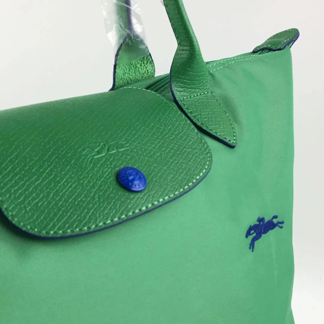 Longchamp L - Verde cacto com acabamento azul